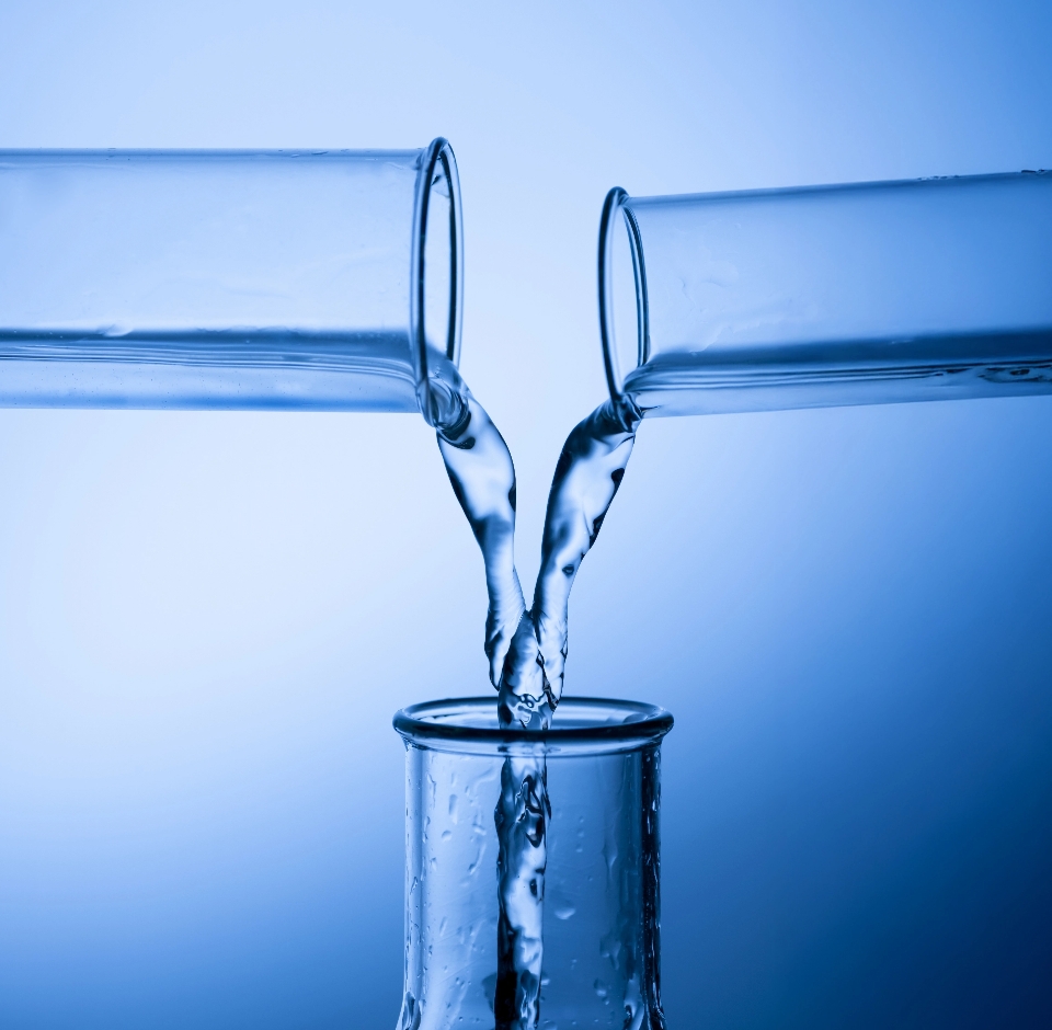 test tube pouring liquid